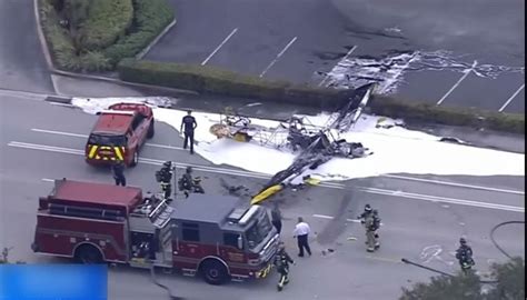 Banner plane crashes, bursts into flames near Memorial Regional Hospital; pilot dead, hailed as hero